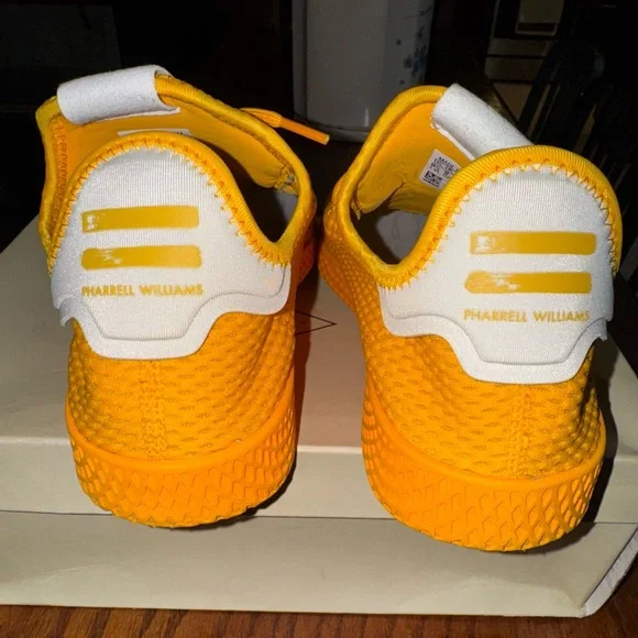 Adidas Pharrell williams Hu “solid gold” tennis shoes size 9.5(Like NEW)